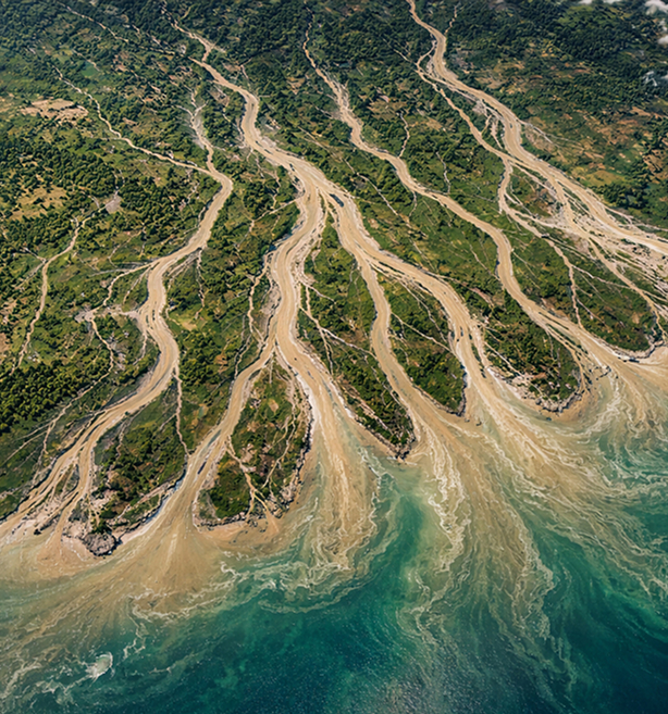 aerial-view-of-a-train-crossing-a-railway-bridge